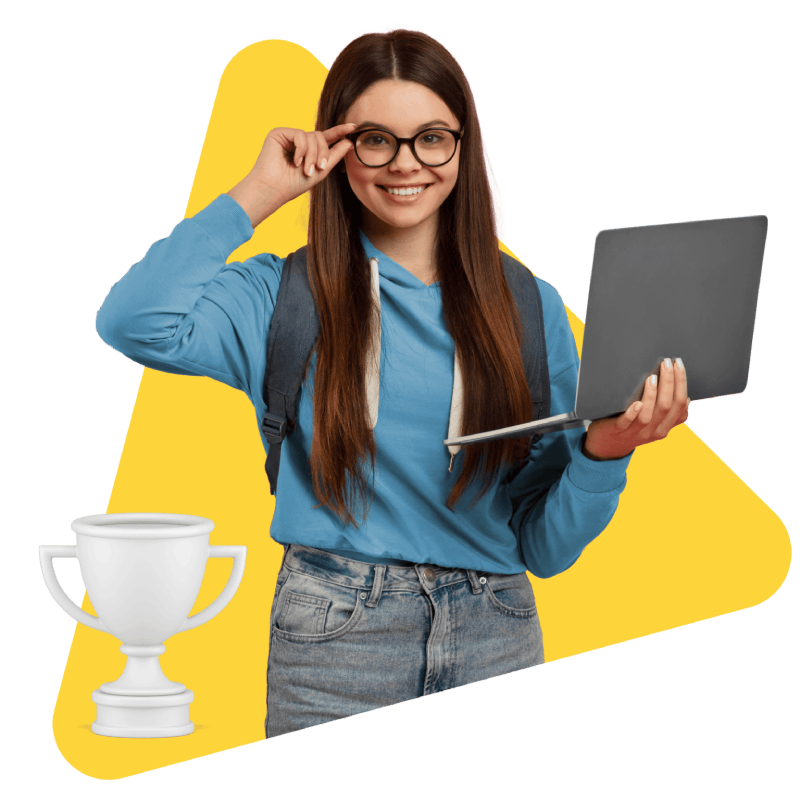 A woman proudly holds a laptop in one hand and a trophy in the other, symbolizing achievement and success.