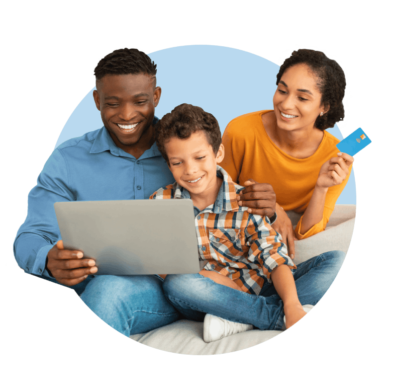 A family gathered around a laptop, engaging in a shared activity and enjoying quality time together.