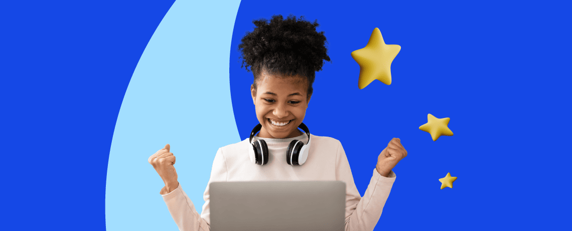 A woman wearing headphones smiles while working on her laptop, exuding a sense of joy and engagement